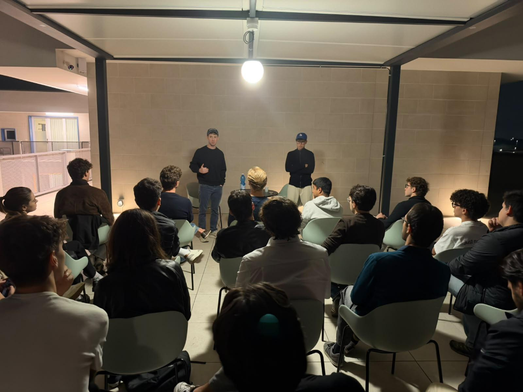Cory Levy speaking at a fireside chat