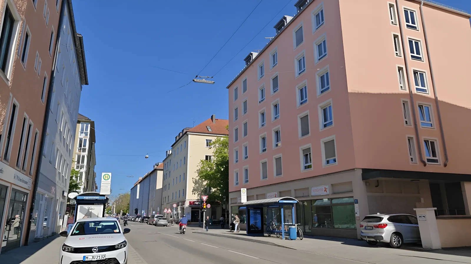 A street in Munich under a clear blue sky